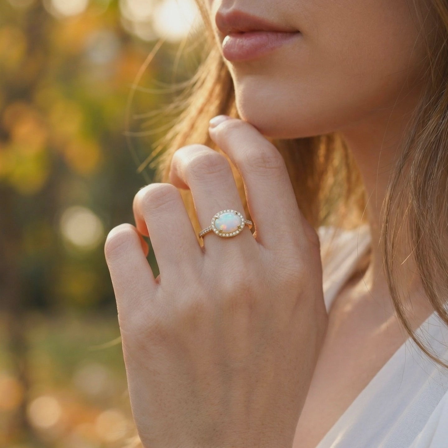 Video of The Magnolia Opal Ring, a solid gold ring with a natural opal.