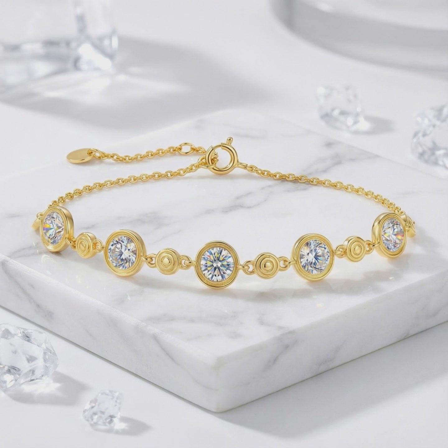 Mirellia station bracelet in solid gold with simulated diamonds.