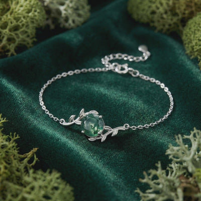 Solid white gold moss agate bracelet.