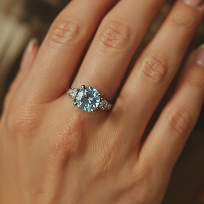 The Eveline 1 carat round cut ocean blue moissanite ring in solid gold