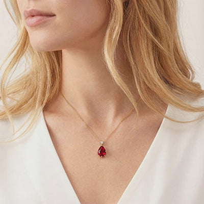 The Celestara Teardrop simulated ruby necklace in solid gold.