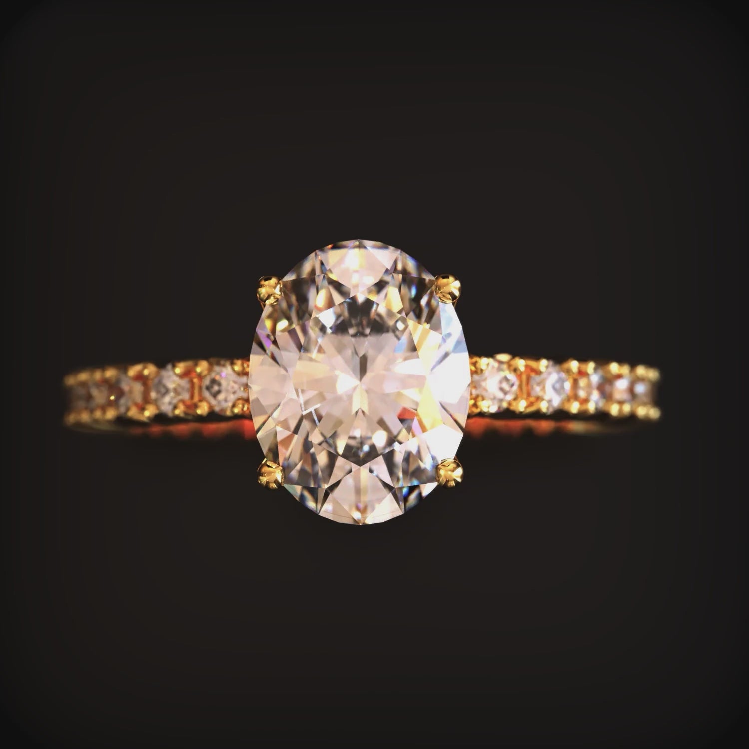 A video of the Amorette 14K solid gold ring with oval moissanite.