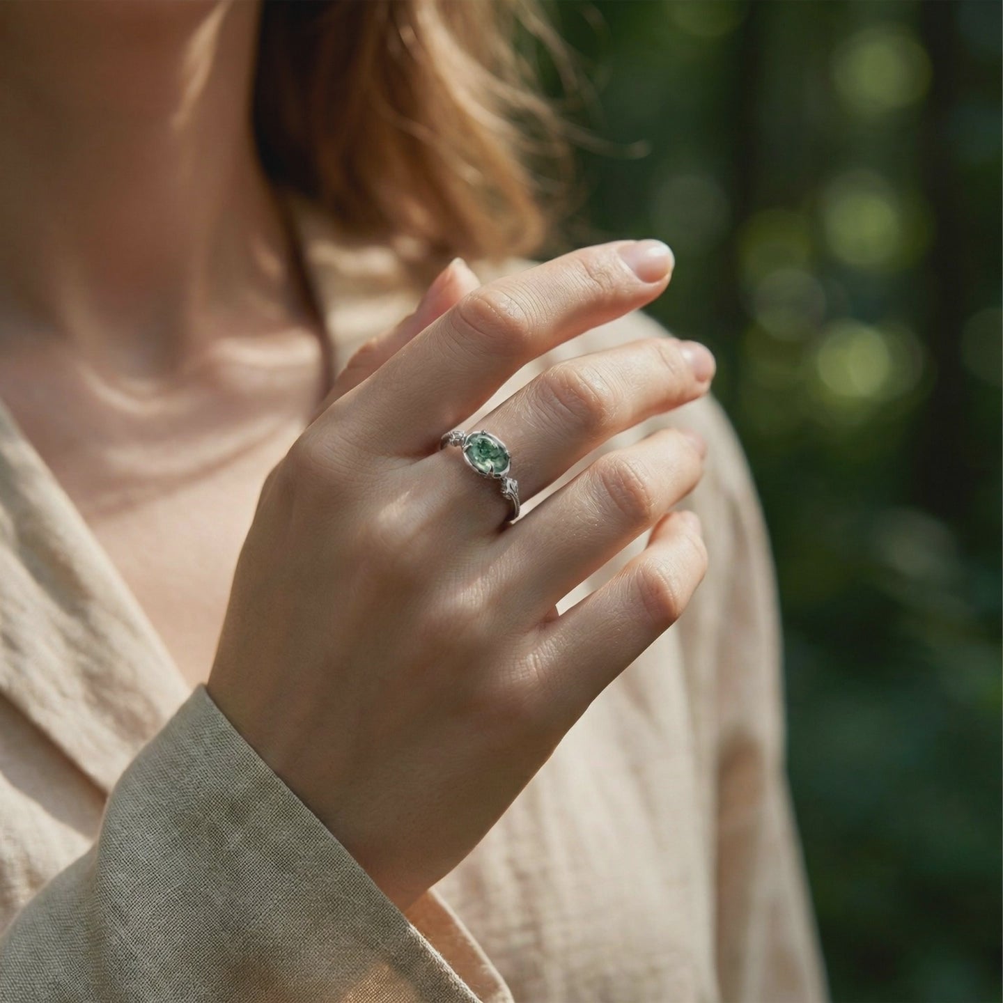 Video of an oval natural moss agate solid gold ring.