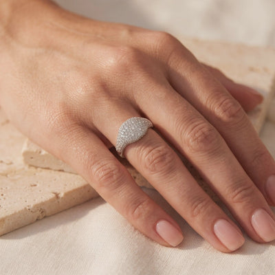 14K and 18K solid gold pave dome ring in white gold with simulated diamonds.
