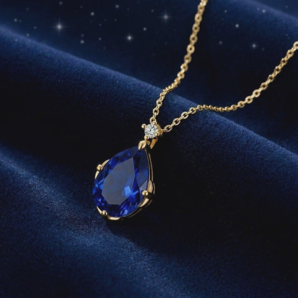 Mariselle Pear simulated sapphire necklace in solid gold.