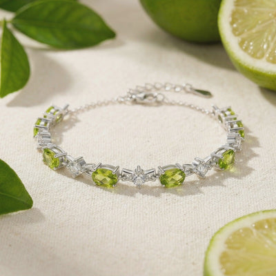 Solid gold bracelet with simulated peridot stones.