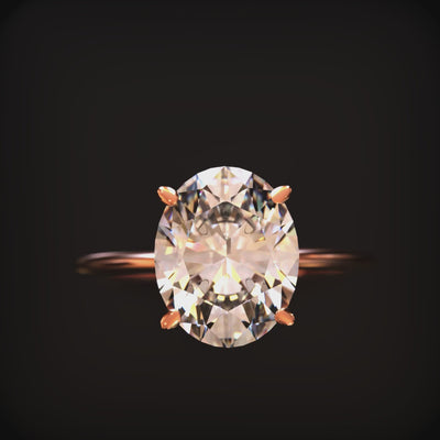 The Bella oval moissanite solitaire ring in 14K solid gold.