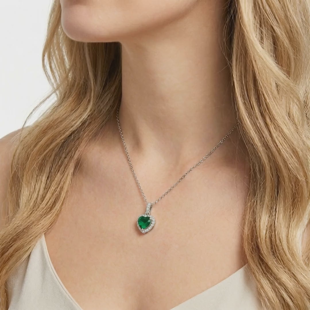 Simulated emerald necklace in solid gold.