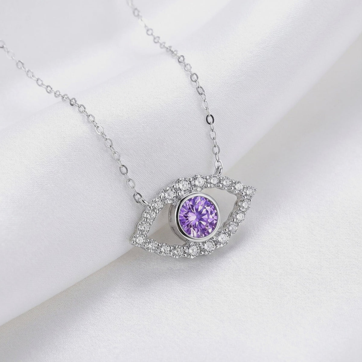 Solid gold tennis bracelet with simulated amethysts.