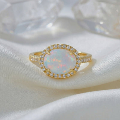 Video of The Magnolia Opal Ring, a solid gold ring with a natural opal.