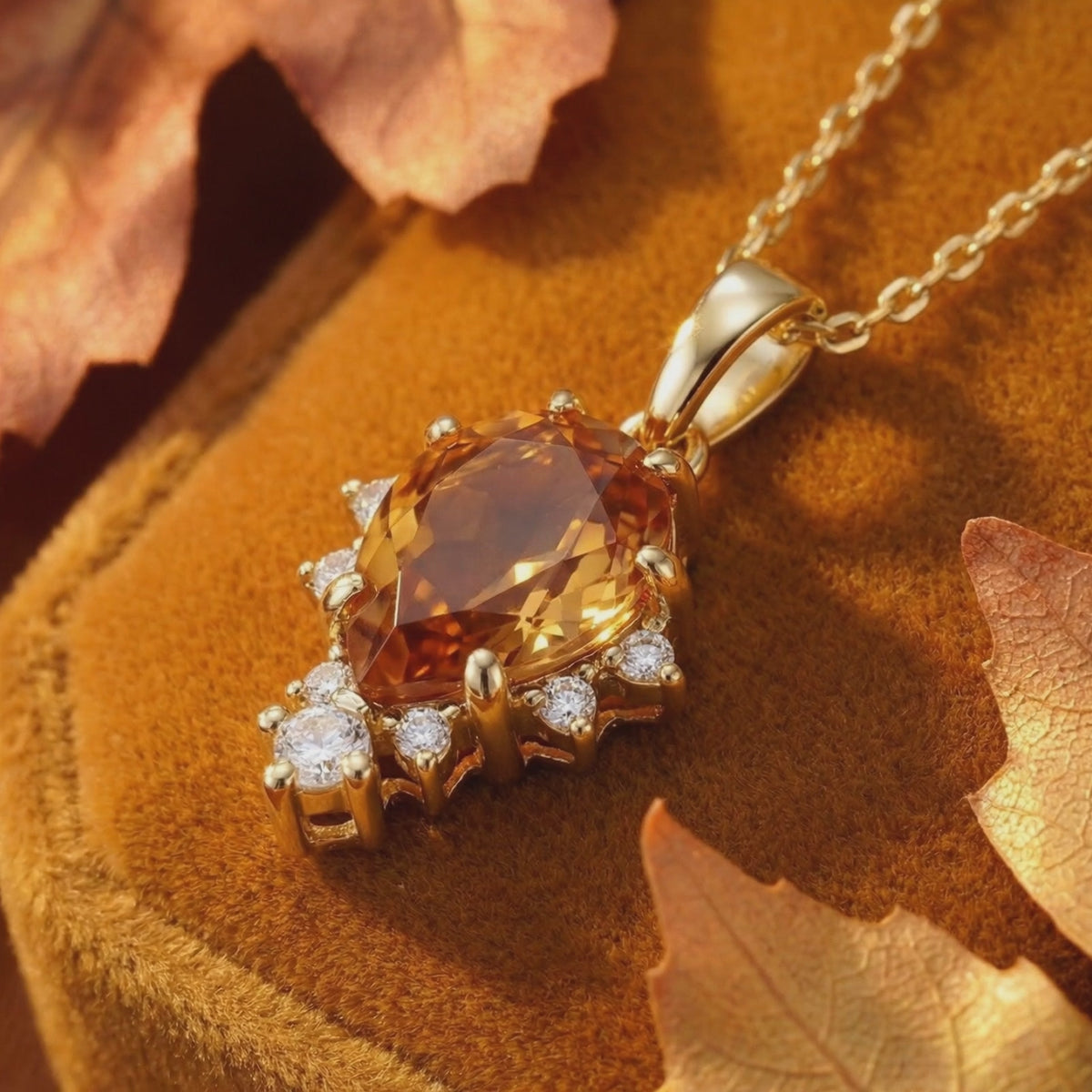Video showcasing The Calyssie pear-cut Simulated Topaz solid gold necklace.