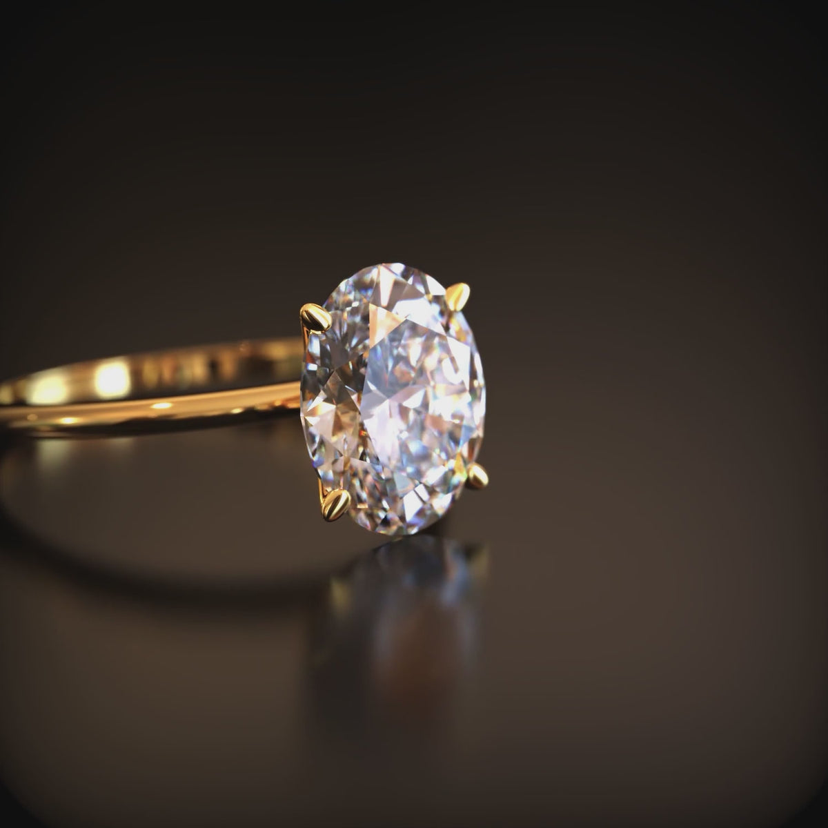 The Bella oval moissanite solitaire ring in 14K solid gold.
