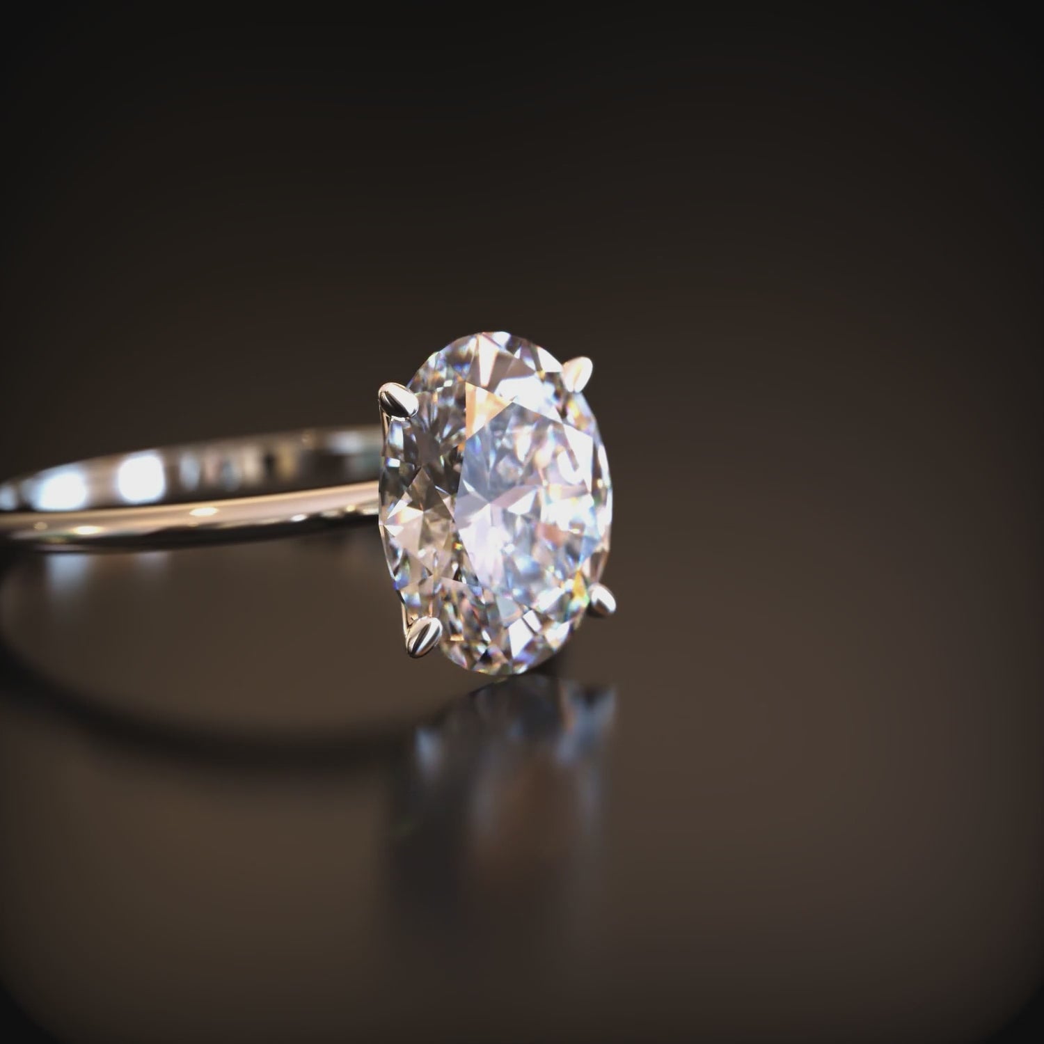 The Bella oval moissanite solitaire ring in 14K solid gold.