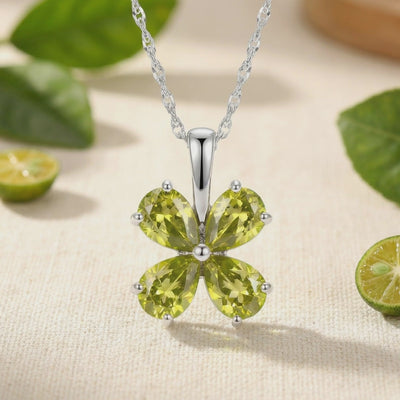 Solid gold necklace with simulated peridot stones.