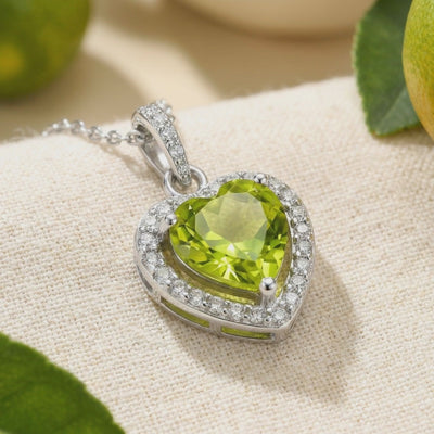 Heart-cut simulated peridot solid gold necklace.