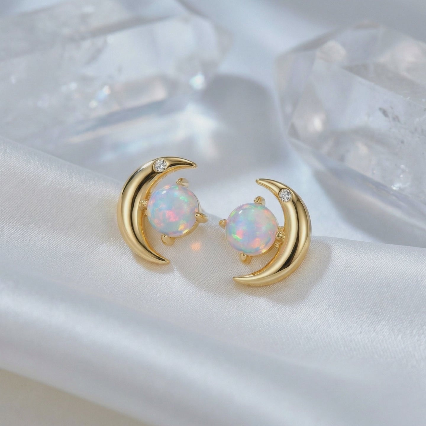 Orianna opal crescent moon stud earrings in solid gold.
