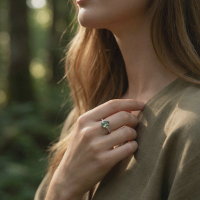 Oval natural moss agate solitaire ring crafted in 14K or 18K solid white gold.