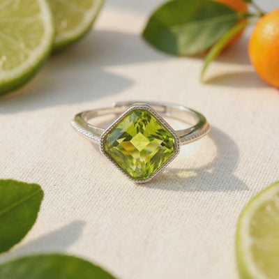 Arisala square simulated peridot ring in solid gold.