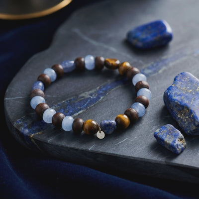 A solid gold Lapis Lazuli bead bracelet.