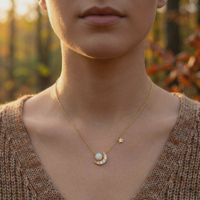 Solid gold necklace with natural opal pendant.