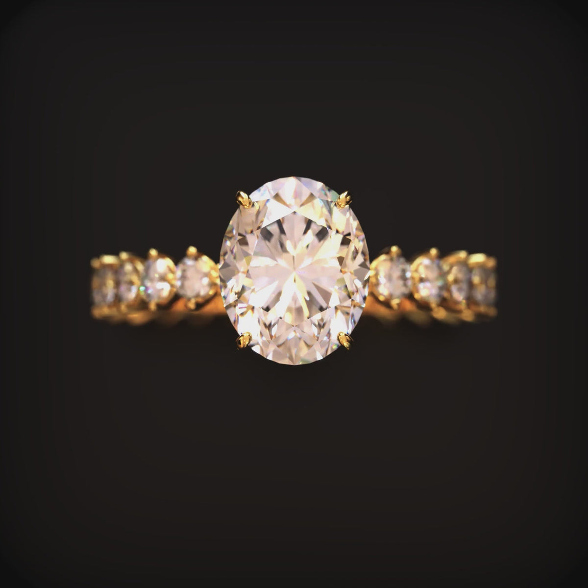 A ring with a 2 carat oval moissanite center stone and a gold eternity band.