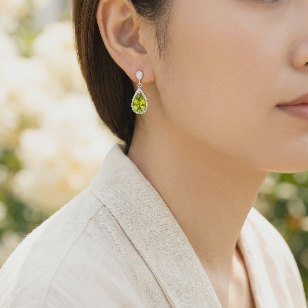 Valerelle Drop earrings with simulated peridot in solid gold.