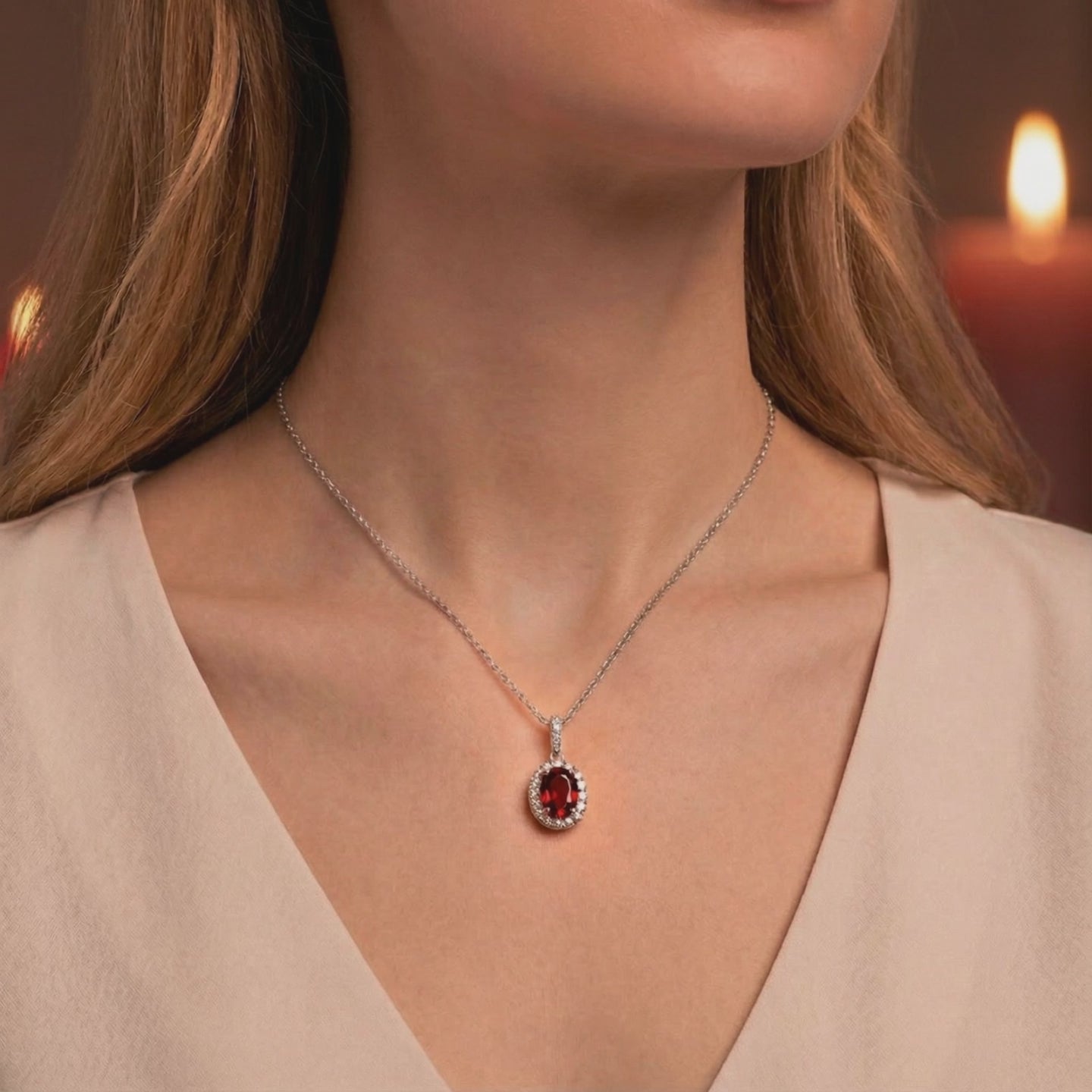 The Orielle Halo simulated garnet halo necklace in solid gold.