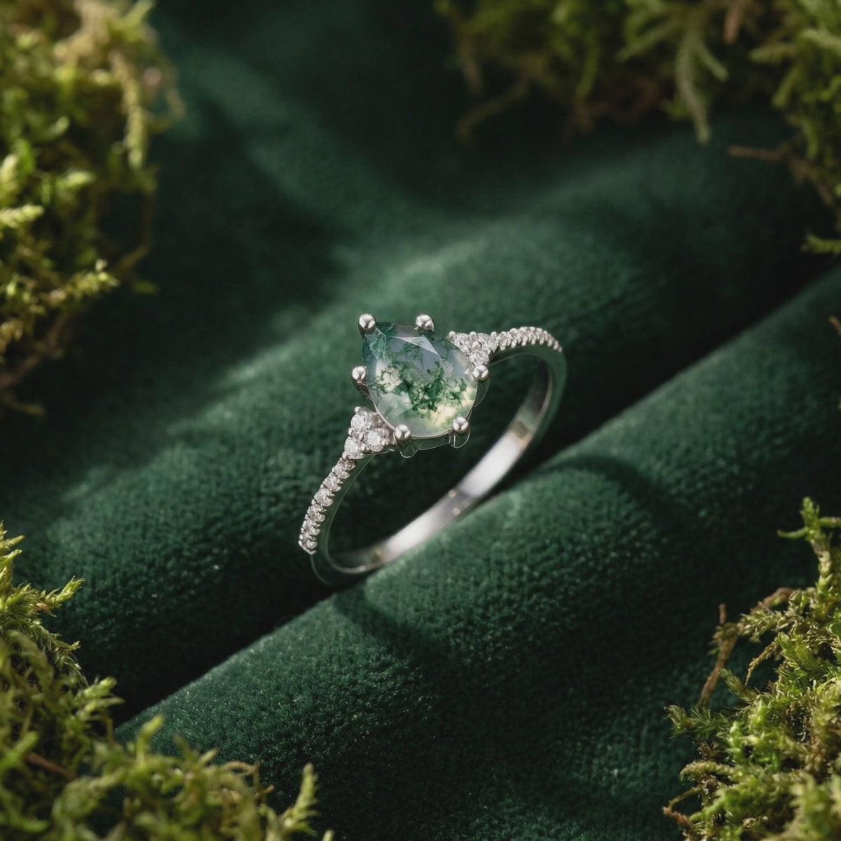 Oval natural moss agate solitaire ring crafted in 14K or 18K solid white gold.