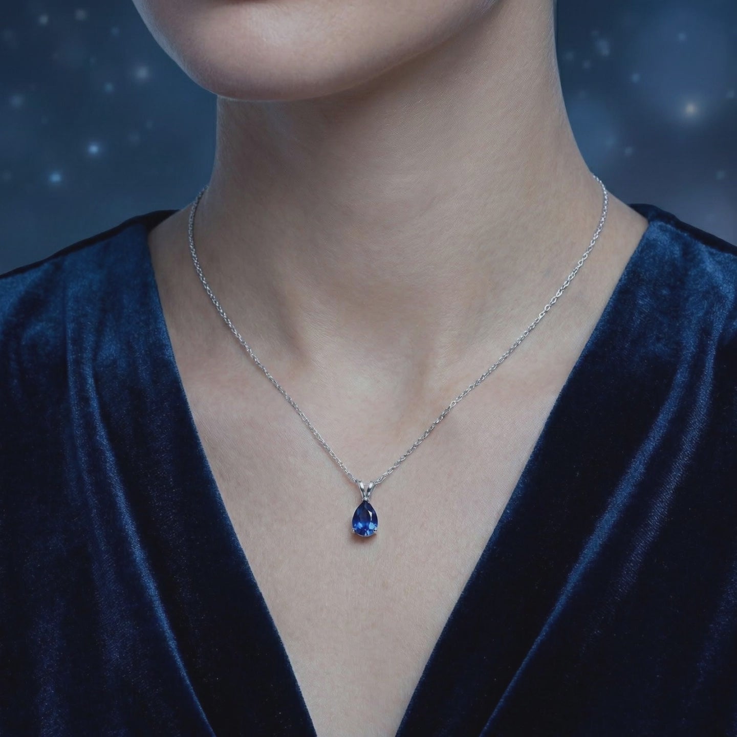 Sapphire Blue Moissanite pendant necklace in solid gold.