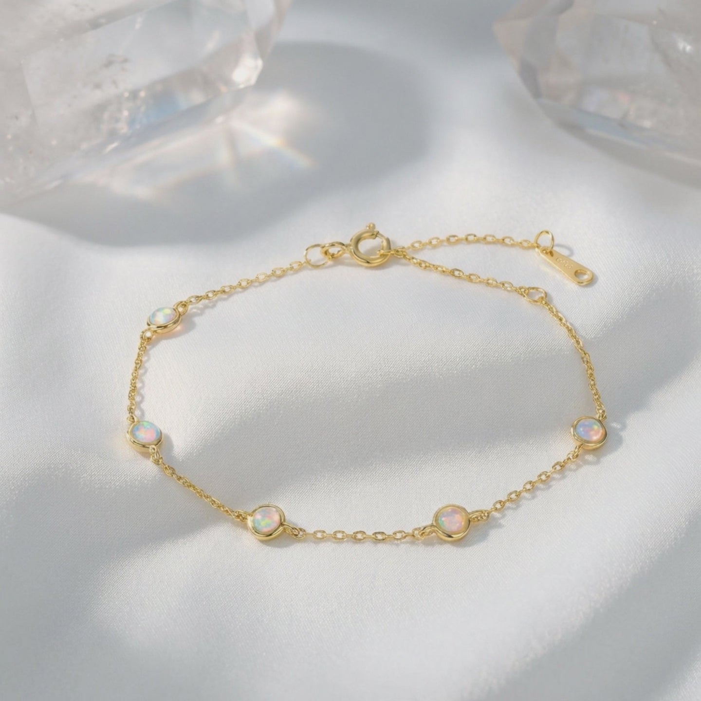 Solid gold bracelet with opals.