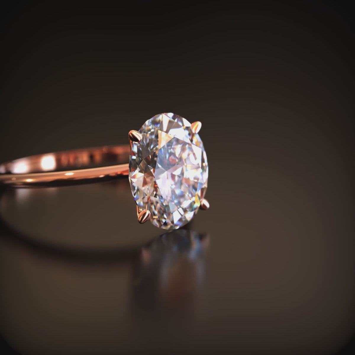 The Bella oval moissanite solitaire ring in 14K solid gold.