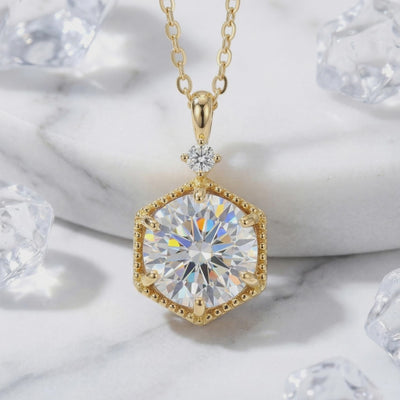 The Hexa Radiant solid gold necklace with a simulated diamond pendant.