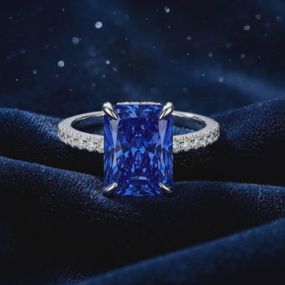 Radiant cut simulated sapphire ring in solid gold.