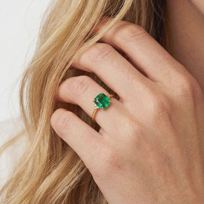 Simulated emerald solid gold ring.