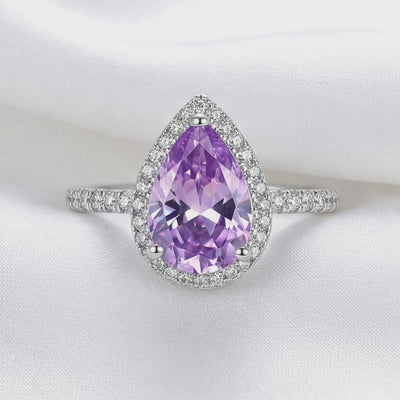 Video of the Odette simulated amethyst halo ring in solid gold.