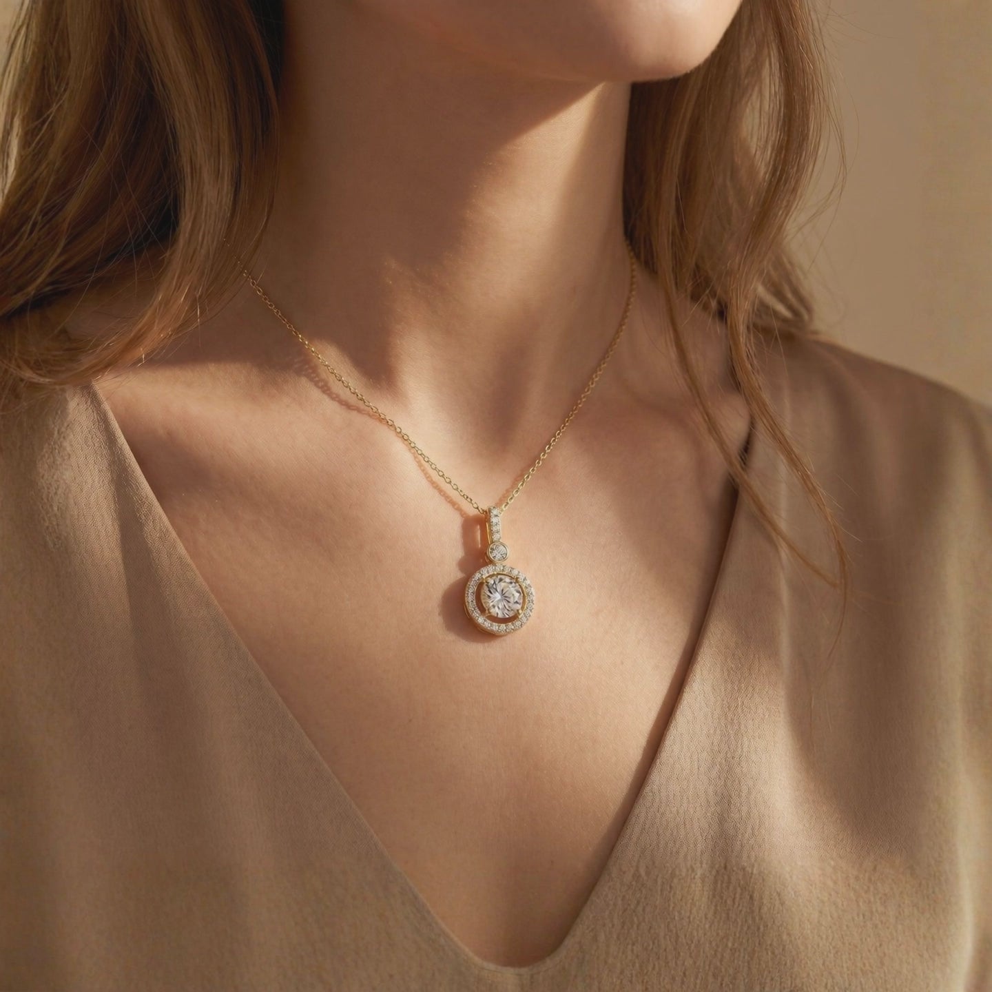 Antoinette moissanite halo pendant necklace in solid gold.