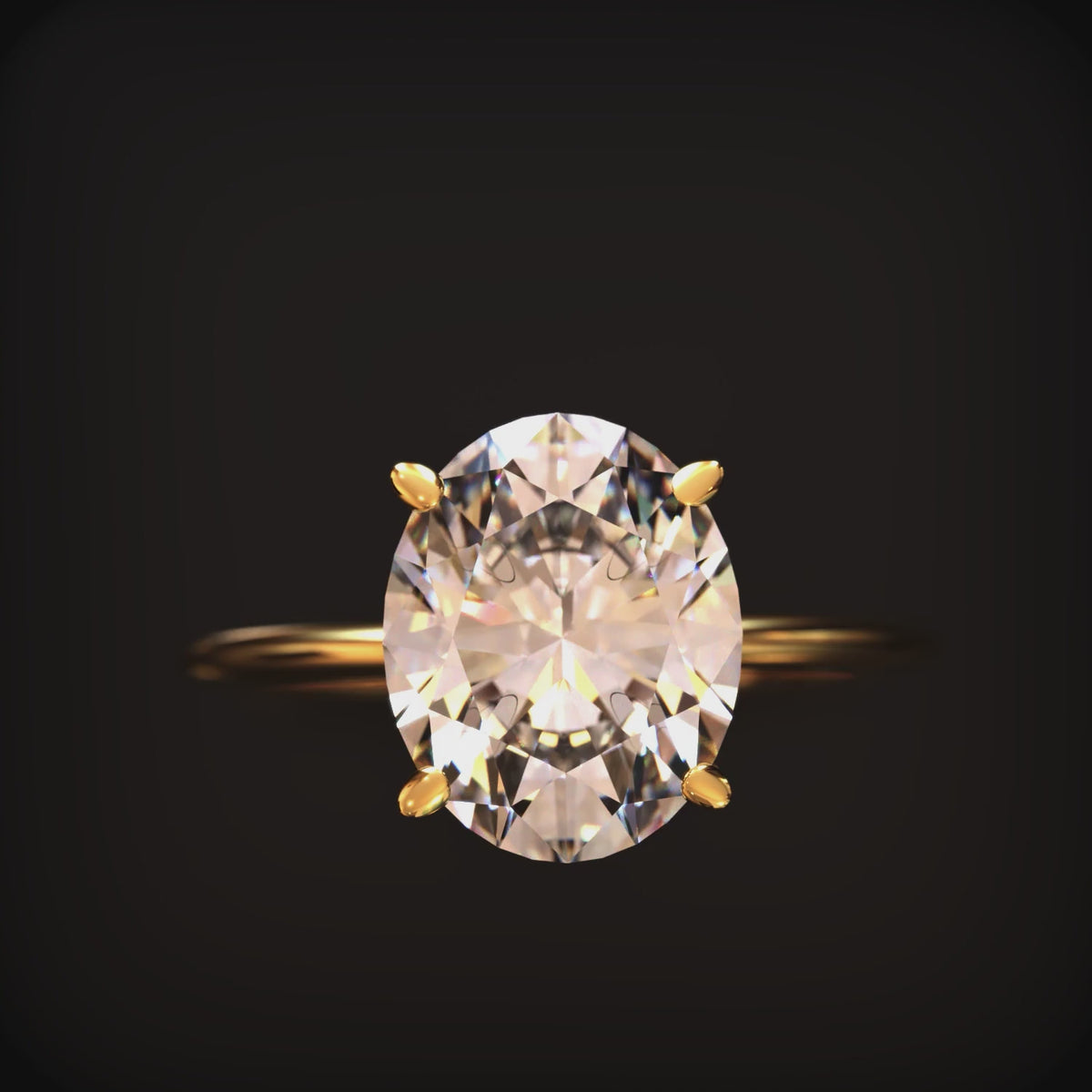The Bella oval moissanite solitaire ring in 14K solid gold.