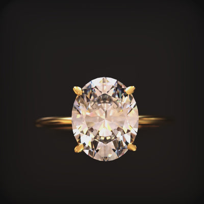 The Bella oval moissanite solitaire ring in 14K solid gold.