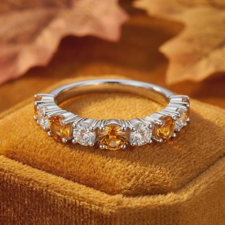 Video of the Novara solid gold ring with simulated topaz.