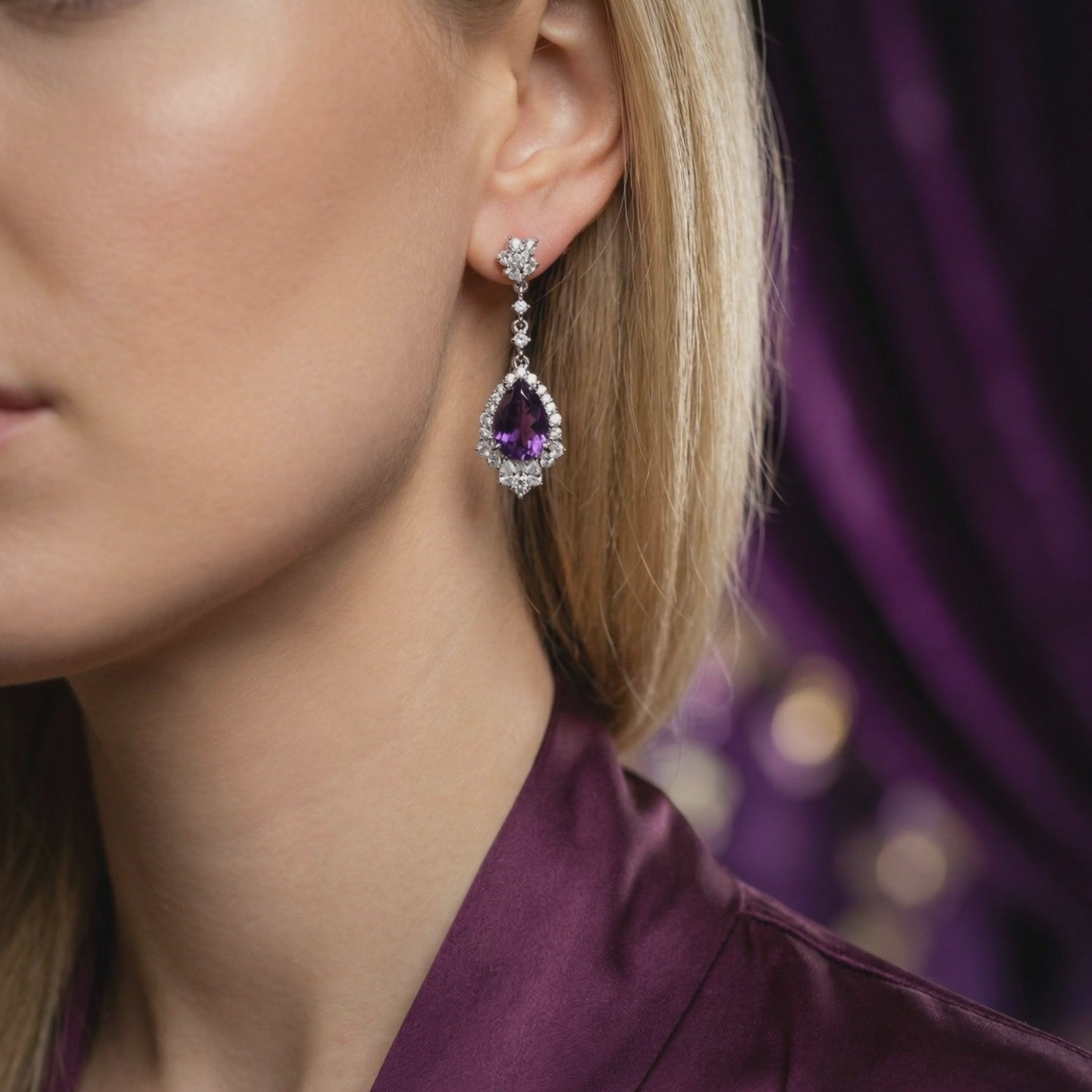 Natural amethyst pear drop earrings in solid gold.