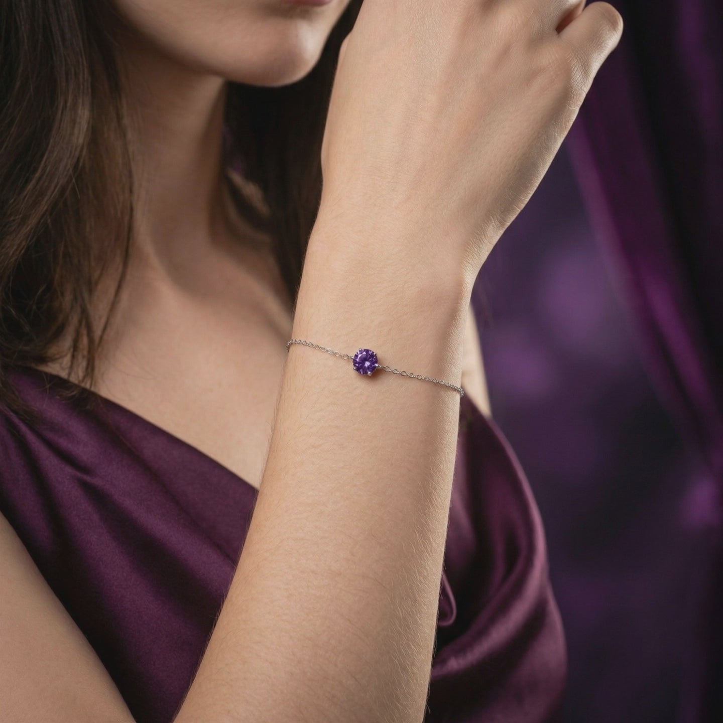 A solid gold amethyst solitaire bracelet.