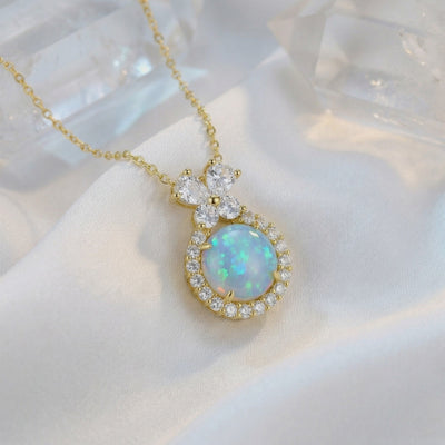 The Orianne natural opal solid gold necklace.
