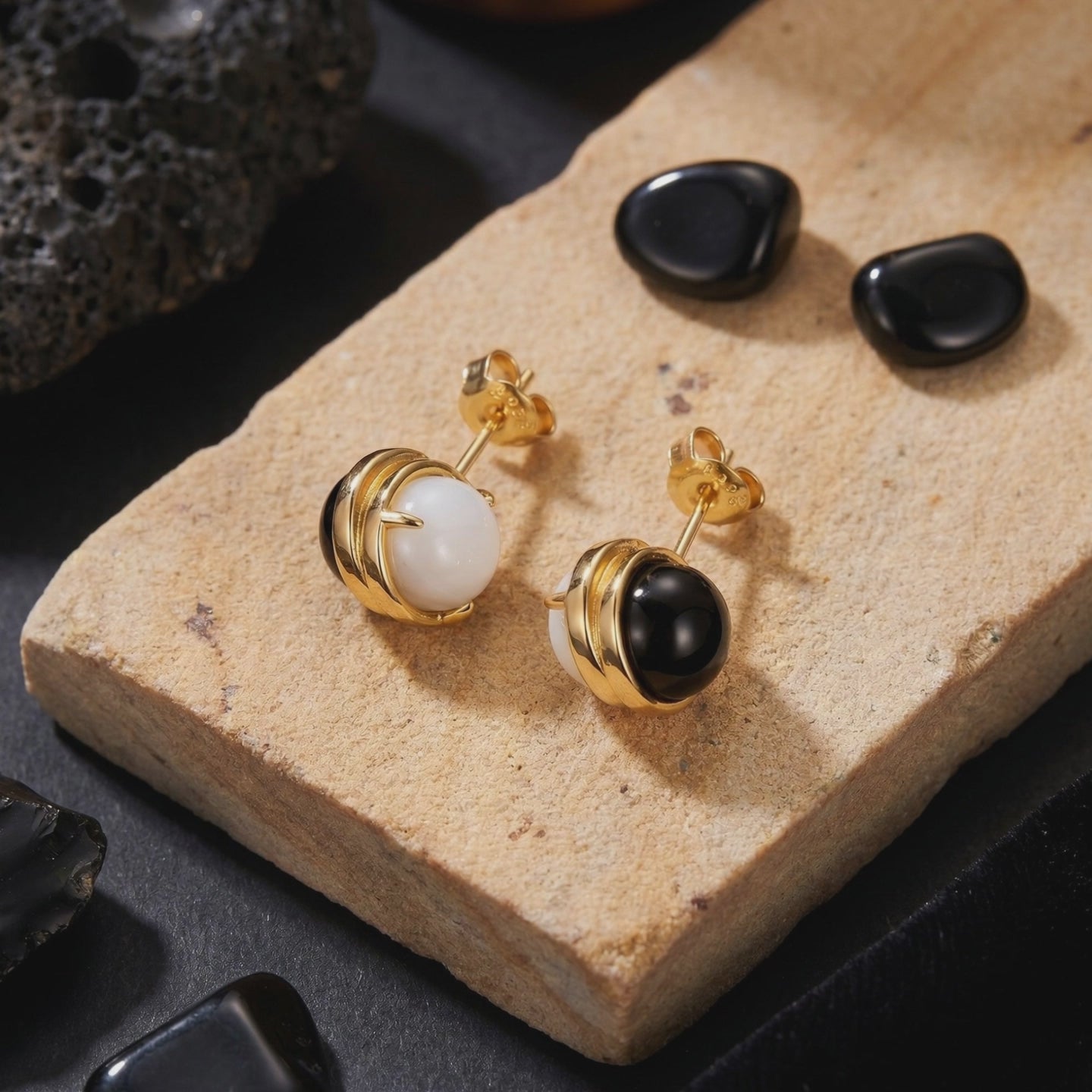 The Ravenna Onyx drop earrings in solid gold.