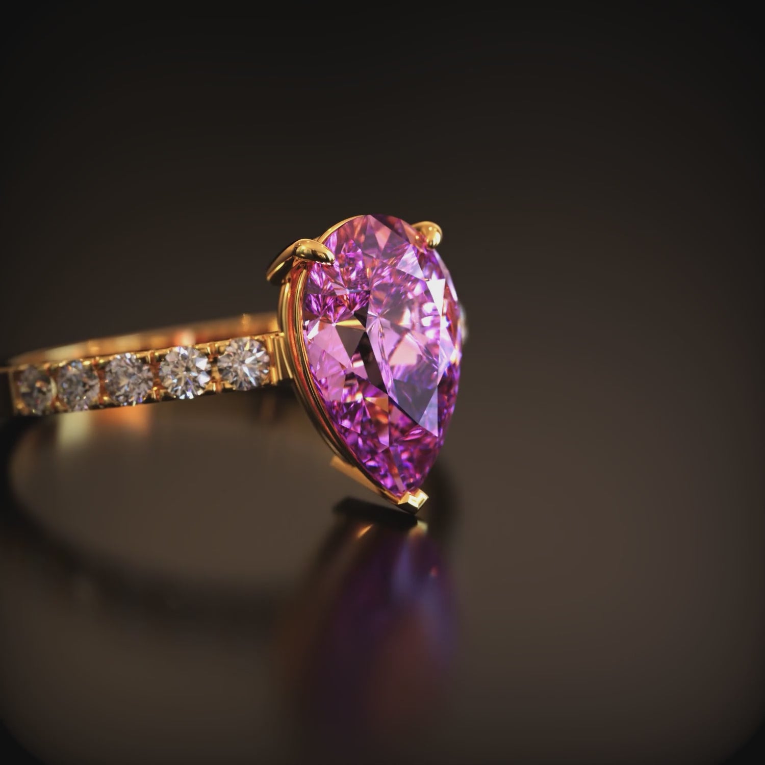 Video showcasing The Celina solid gold ring with a pink moissanite.