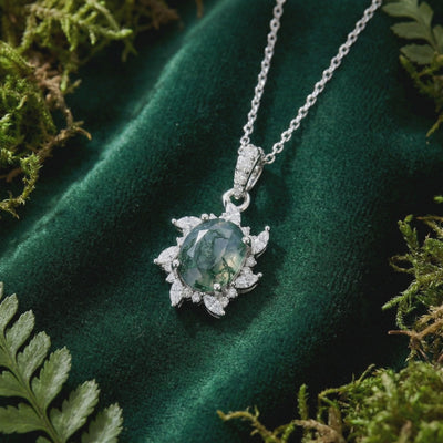 Starburst moss agate pendant necklace in solid white gold.