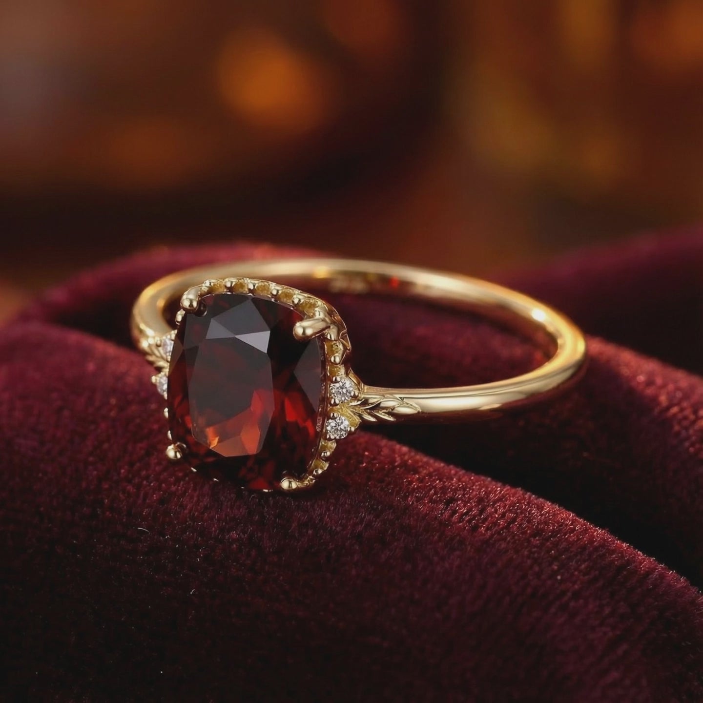Valerine solid gold ring with simulated garnet.