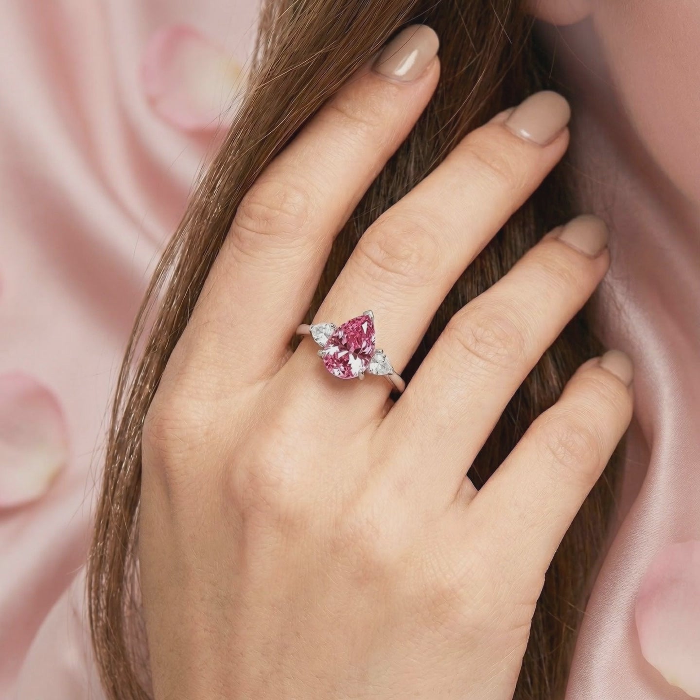 Video showcasing the pear-cut simulated pink tourmaline solid gold ring.