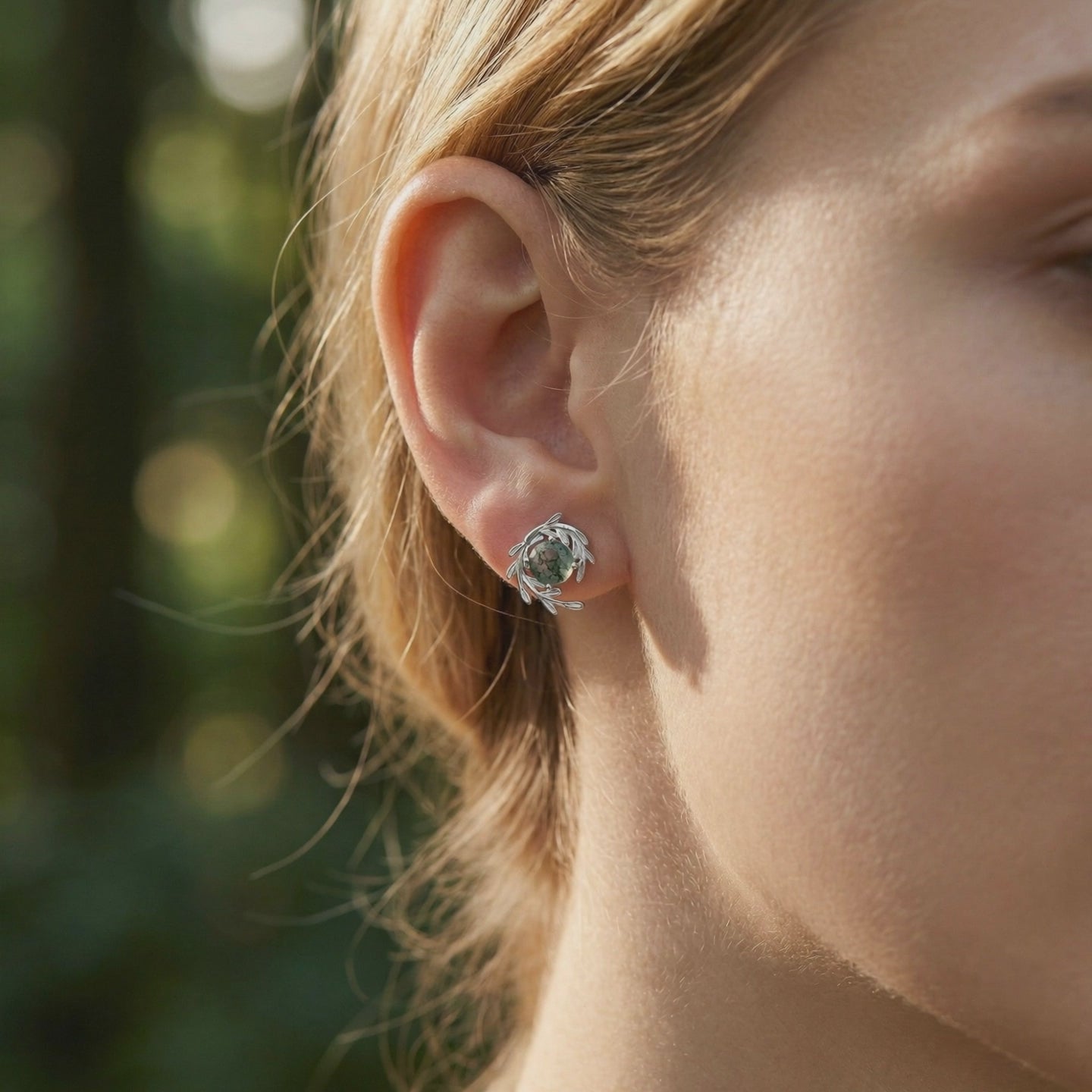Natural Moss Agate vine wrap stud earrings in solid white gold.