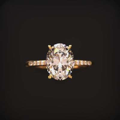 Video of an oval moissanite ring in solid gold.