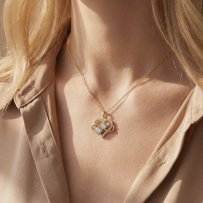 Aureliette moissanite heart infinity gold necklace.